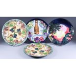 A Moorcroft Pottery Limited Edition 2000 Year Plate, No. 1110 of 2000, 9ins diameter, a Limited