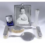 A Late Victorian Silver Rectangular Photograph Frame and Mixed Silverware, the frame by William