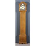 An Early 20th Century Oak "Grandmother" Clock, by Elliott of London, No. 25249, the 8ins arched