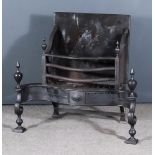 A 19th Century Steel Fire Grate, the pierced serpentine front with turned finials, on scroll