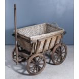 A Wooden and Metal Mounted Hand Cart with Slatted Sides, 21ins wide x 34ins deep x 23ins high, and a