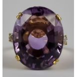 A Large Amethyst and Diamond Ring, Modern, 18ct gold, set with a centre amethyst approximately