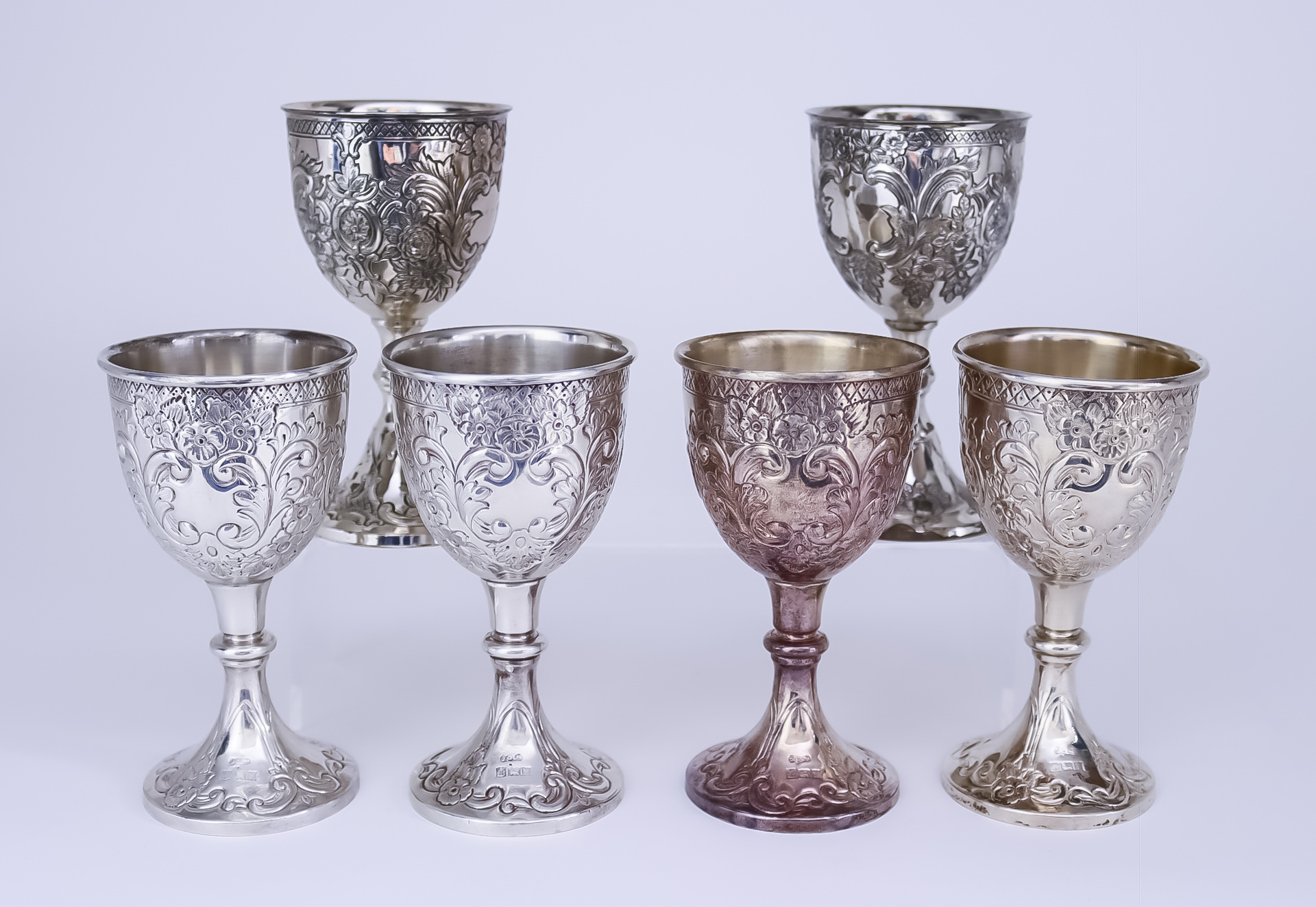 Four Elizabeth II Cast Silver Goblets and Two Similar Plated Goblets, the silver goblets by Joseph