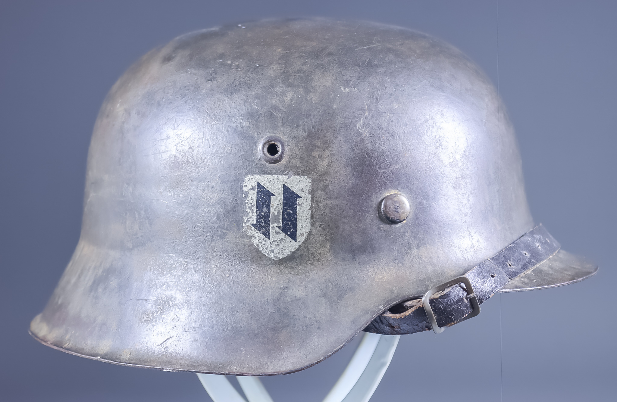 A German World War II SS Helmet, the M42 style steel helmet in green bearing Croatian SS Runes