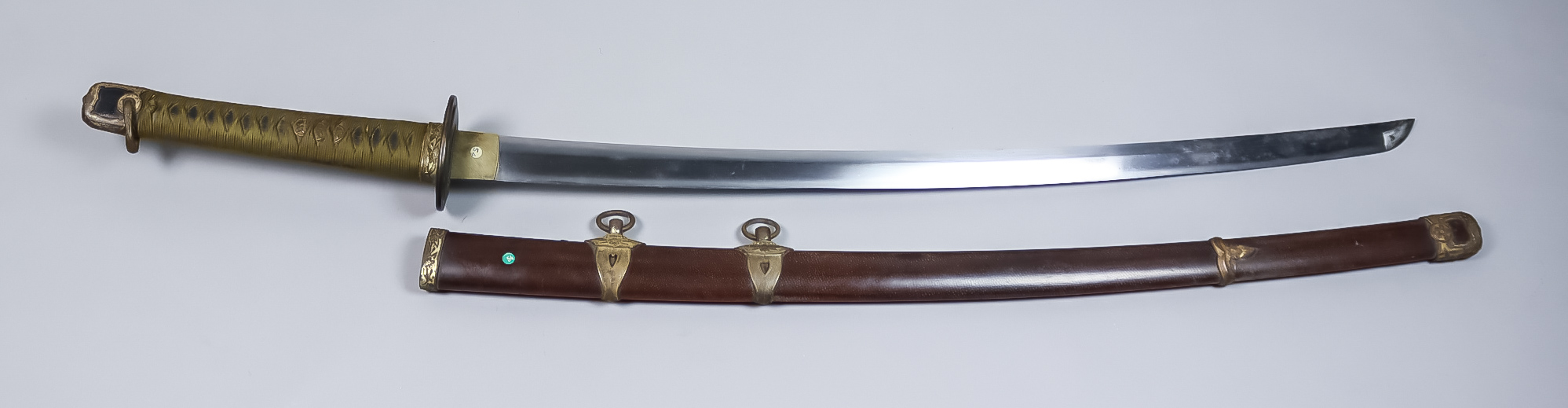 A World War II Japanese Tachi, Naval, Kai-Gunto, Showato blade, blade marked with Toyokawa naval