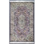 Two Modern Rugs of "Persian" Design, one woven in navy blue, rose and ivory with a central floral