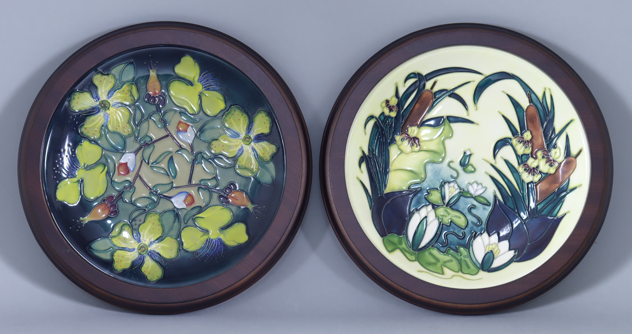 A Moorcroft Pottery Plate With Lamia Design, decorated with bulrushes and water lilies, 10.26ins,