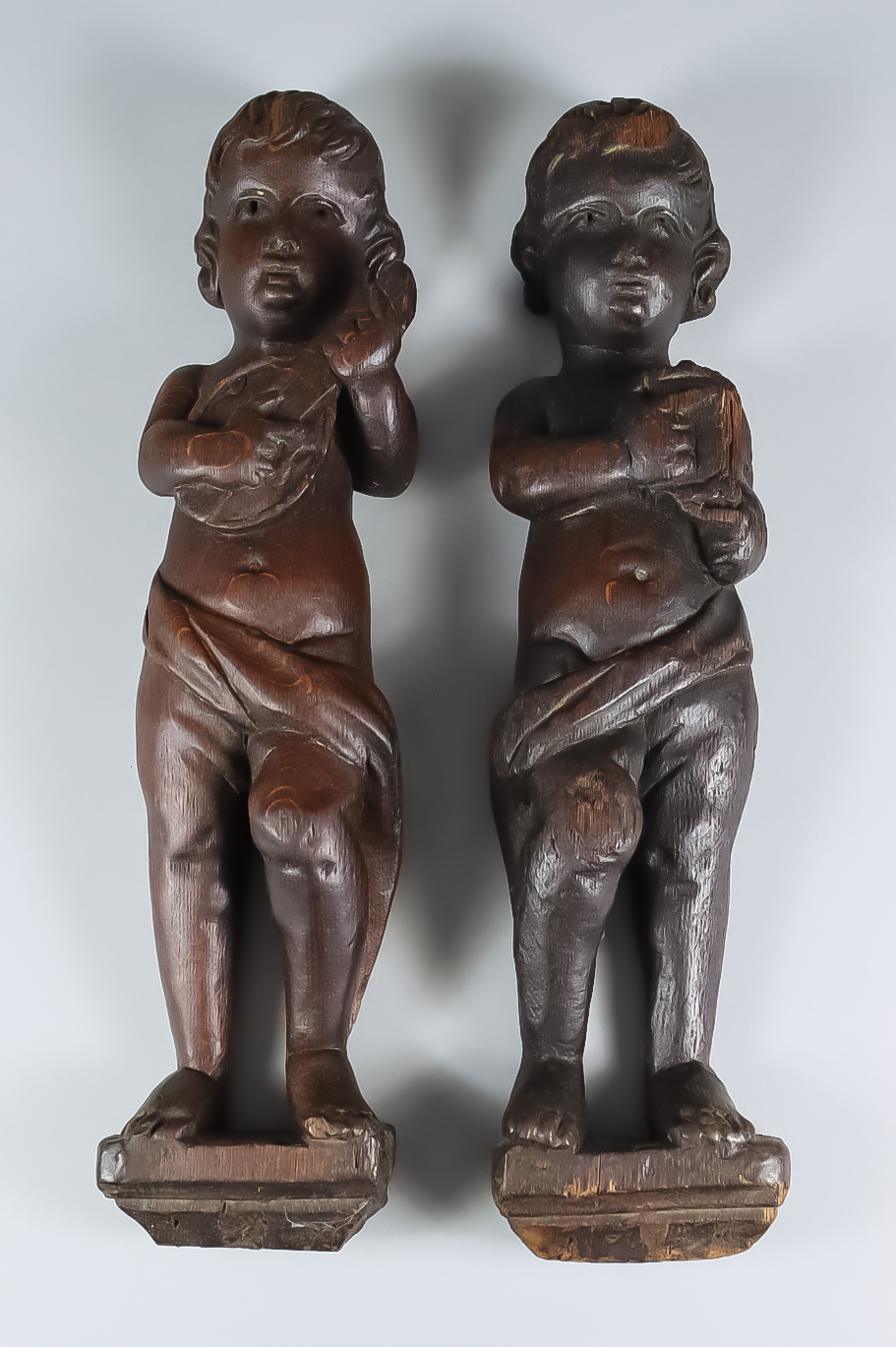 A Pair of English Carved Oak Musician Figures, 17th Century, 14.5ins high