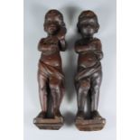 A Pair of English Carved Oak Musician Figures, 17th Century, 14.5ins high