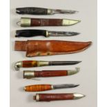 A Collection of Five 20th Century Continental Hunting Knives, each with scabbard