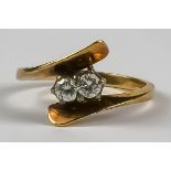 A Two Stone Crossover Diamond Ring, Modern, gold colour metal, set with two brilliant cut white