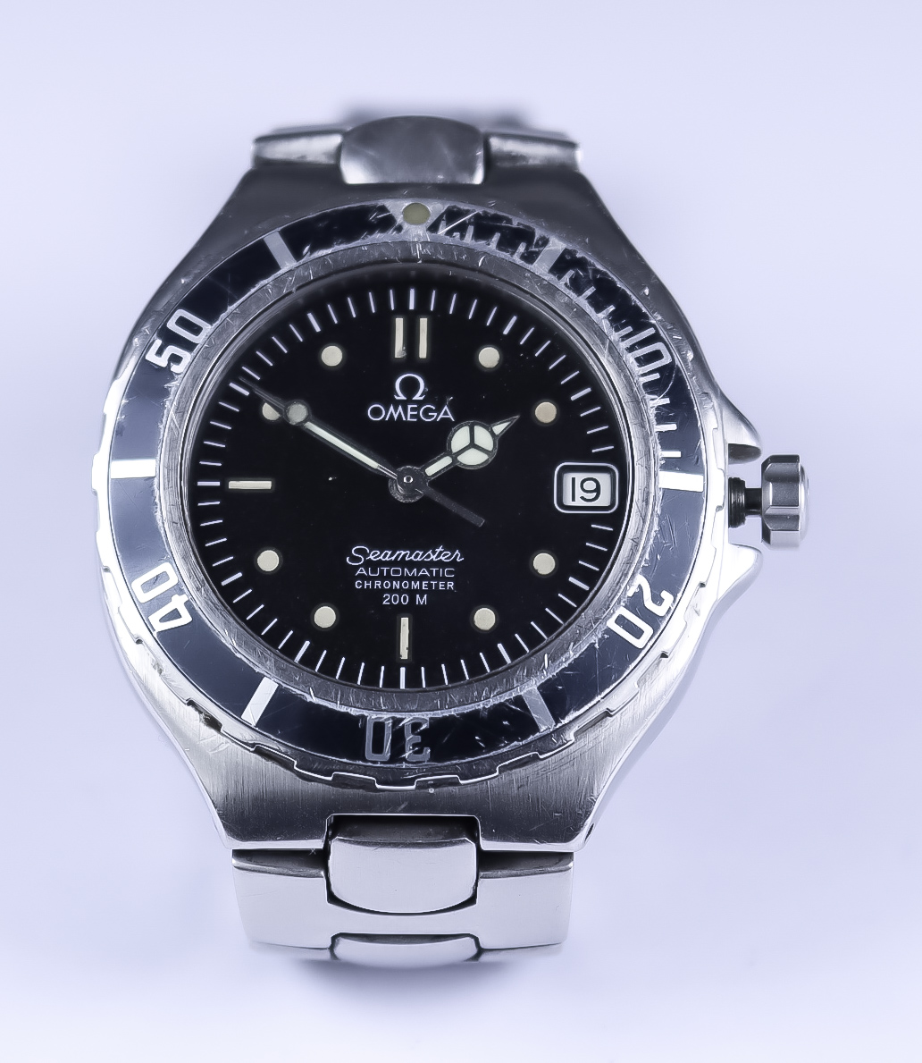 An Omega "Seamaster" Automatic Wristwatch, stainless steel case, 38mm, the black dial with