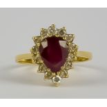 A Ruby and Diamond Ring, Modern, 18ct yellow gold, set with a centre pear shaped ruby, approximately