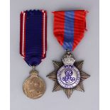 An Edward VII Royal Victorian Medal (Bronze), and an Edward VII Imperial Service medal to Dorilas