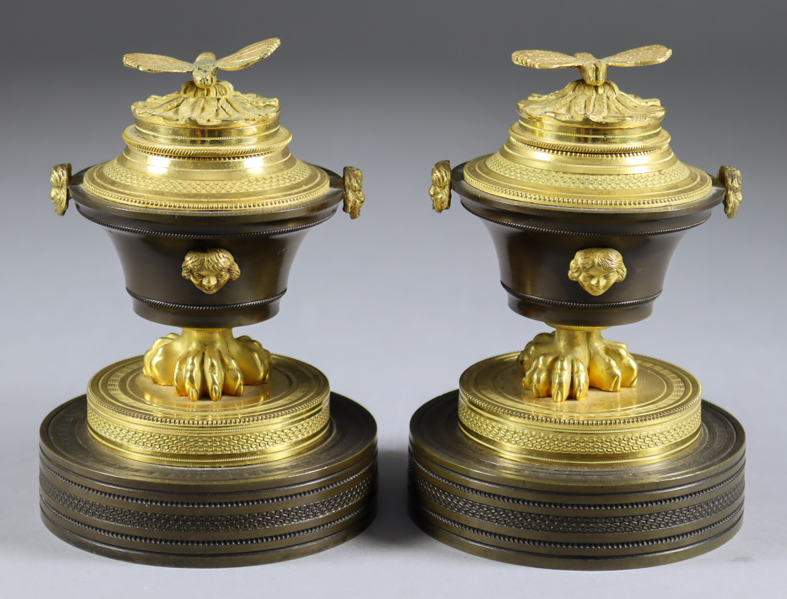 A Pair of Ormolu and Bronze Desk Ink Wells, Early 19th Century, with dragonfly pattern finials, 4.