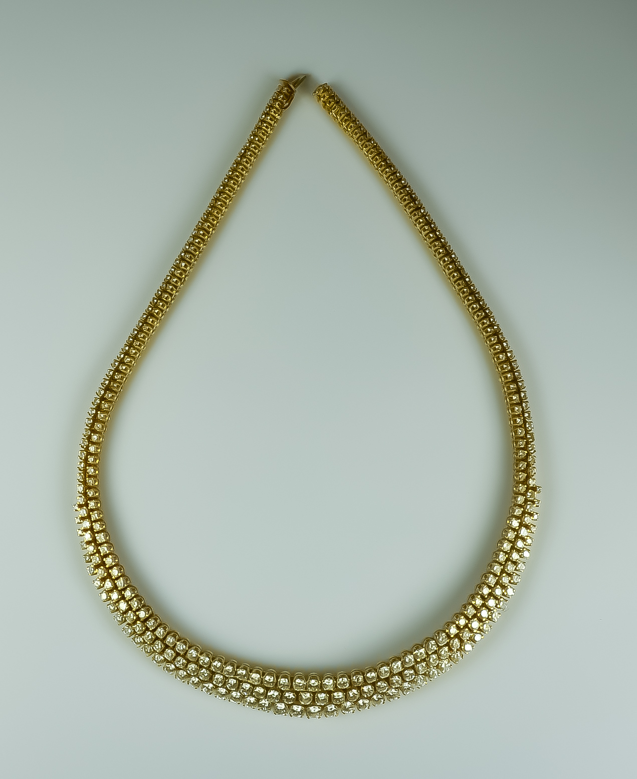 A Diamond Necklace, Modern, 18ct gold, set with brilliant cut white diamonds, approximately 20ct