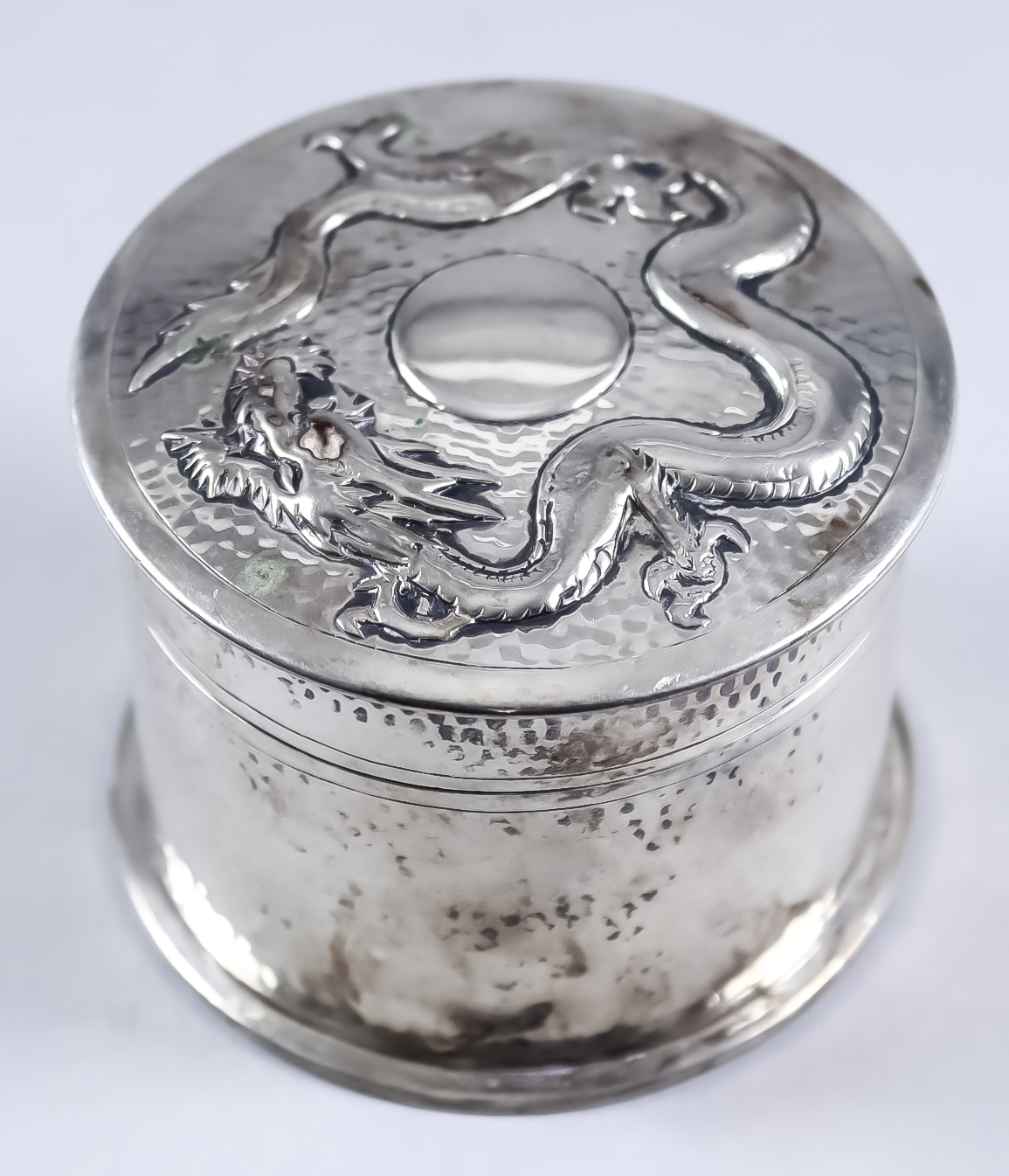 A Chinese Silver Cylindrical Box and Cover, Late 19th/Early 20th Century, by Tuck Chang & Co, with a