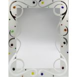 A Rectangular Frameless Wall Mirror, 1980's, the wide frosted borders with scroll decoration and
