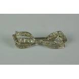 A Diamond Set Bow Brooch, Modern, 9ct white gold set with brilliant cut white diamonds approximately