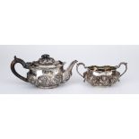 A Victorian Silver Oval Teapot and Two-Handled Sugar Basin, by William Comyns & Sons, London 1892