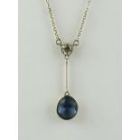 A Sapphire and Diamond Pendant, Modern, the yellow metal set with a sapphire of approximately 2ct