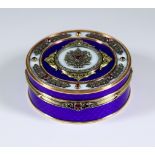 A Modern Two Coloured Gold Metal Enamel Diamond and Ruby Set Circular Box, the lid set with old