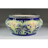 A Moorcroft MacIntyre Pottery Salad Bowl, Circa 1900-1906, tube lined and decorated in colours