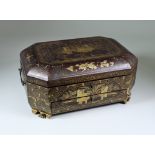 I* A Chinese Black Lacquer Octagonal Workbox, 19th Century, decorated in gilt with figures in