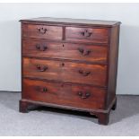 A George III Mahogany Chest, with moulded edge to top, fitted two short and three long graduated