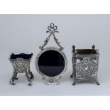 An Edward VII Silver Circular Hanging Photograph Frame and mixed silverware, the frame by