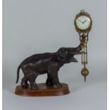 A Late 19th/Early 20th Century Continental Gilt Brass and Bronzed Spelter "Mystery" Timepiece, the