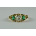 A Diamond and Emerald Ring, 20th Century, yellow metal, set with a centre old European cut