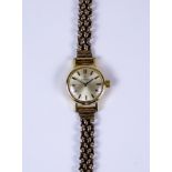 A Lady's Omega Manual Wind Wristwatch, plated case 18mm diameter, silver dial with gold baton