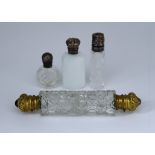 A Late Victorian Silvery Gilt Metal Mounted Glass Double Ended Scent Bottle, and Three Other Scent