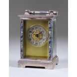 An Early 20th Century French Silvered and Enamelled Carriage Timepiece, the silvered chapter ring