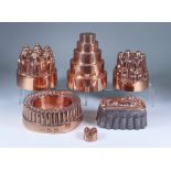 Four Copper Jelly Moulds, 19th Century, comprising - four stepped circular mould by Temple and