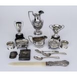 An Edward VII Silver Urn Pattern Milk Jug and mixed silverware, the milk jug by Vale Brothers &