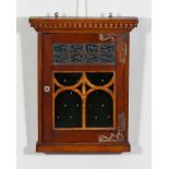 A Late 19th Century Mahogany Key Cabinet, with dentil cornice and enclosed by single glazed door,