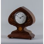 An Early 20th Century Inlaid Mahogany Mantel Timepiece of Art Nouveau Design, the 3.25ins dial