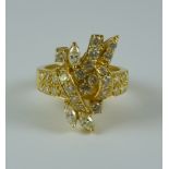 A Diamond Cluster Ring, Modern, yellow metal set with diamonds, approximately 1.5ct total, size J,