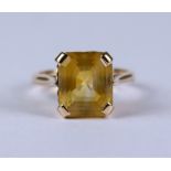 A Citrine Dress Ring, Modern, 14ct gold mount with fancy gallery, set with a faceted citrine stone