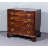 A George III Mahogany Chest, with moulded edge to top, fitted with a brushing slide and four long