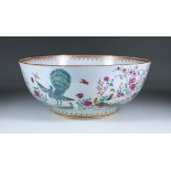 A Chinese Porcelain Punch Bowl, Mid-18th Century, enamelled in colours with birds, flowering trees