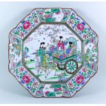 A Japanese Porcelain Octagonal Charger, 20th Century, decorated in the Cantonese manner, the