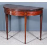 A George III Mahogany Semi Circular Card Table, with baize lined folding top, plain apron, on square