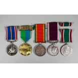A Collection of Military and Commemorative Medals, including the Women's Voluntary Service Medal,