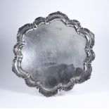 A Victorian Silver Circular Salver, by Maxfield & Sons, London 1894, of lobed form with C scroll