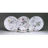 Three Meissen Porcelain Plates, 18th Century, enamelled in colours with Deutsche Blumen, the