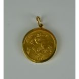 A George V 1912 Half Sovereign, in 9ct gold mount, gross weight 5.1g