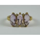 A Three Stone Kunzite Ring, 9ct gold set with three marquess Kunzite stones, each approximately 1ct,